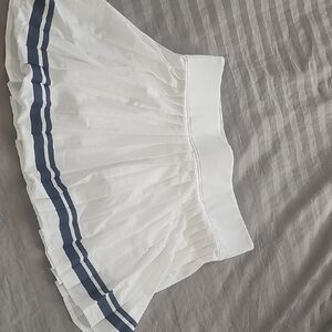 Thrive White Tennis Skirt with Navy Stripes